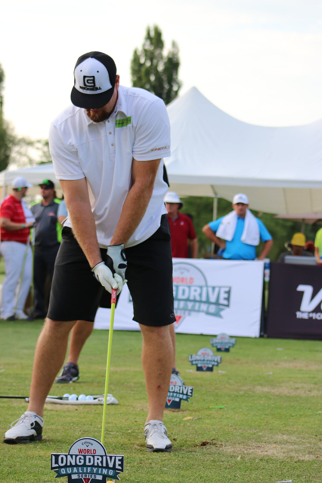 OG Snapback Hat man golfing while wearing the o g rockwell snapback black/white